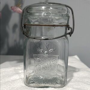 “Queen” embossed canning jar